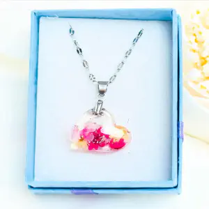 Colgante Corazón — Acero y Mini Flores Naturales